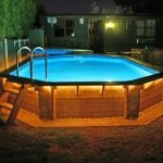 above ground pool with deck above ground pool deck coping nighttime UXKNYBG