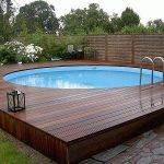 above ground pool with deck modern above ground pool decks ideas wooden deck round pool lawn stone slabs LXZLKOD