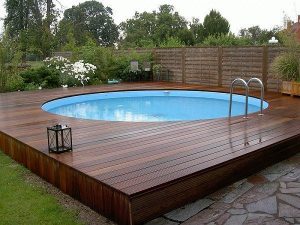 above ground pools with decks modern above ground pool decks ideas wooden deck round pool lawn stone slabs YDJPAZC