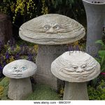 amusing stone mushrooms by david goode as garden ornaments rhs chelsea  flower show 2009 - stock ZRGPEZR