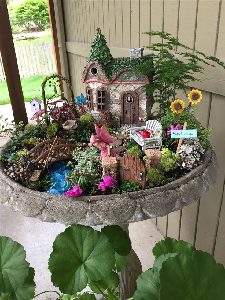 fairy garden. this was a fun project that my granddaughter really enjoyed  helping with. EDEMSYY