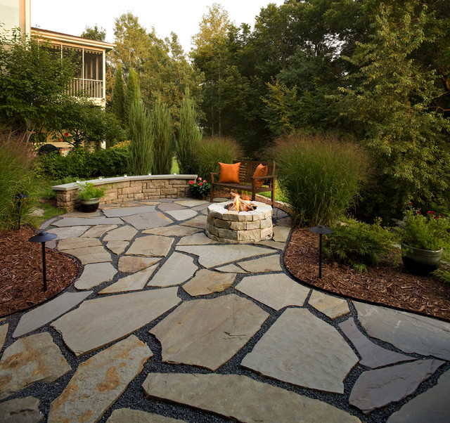 flagstone patio and natural stone fire pit traditional-patio TDQIOYV
