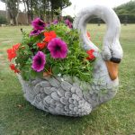 garden ornaments a 60s planter swan in full bloom RUAXSLA