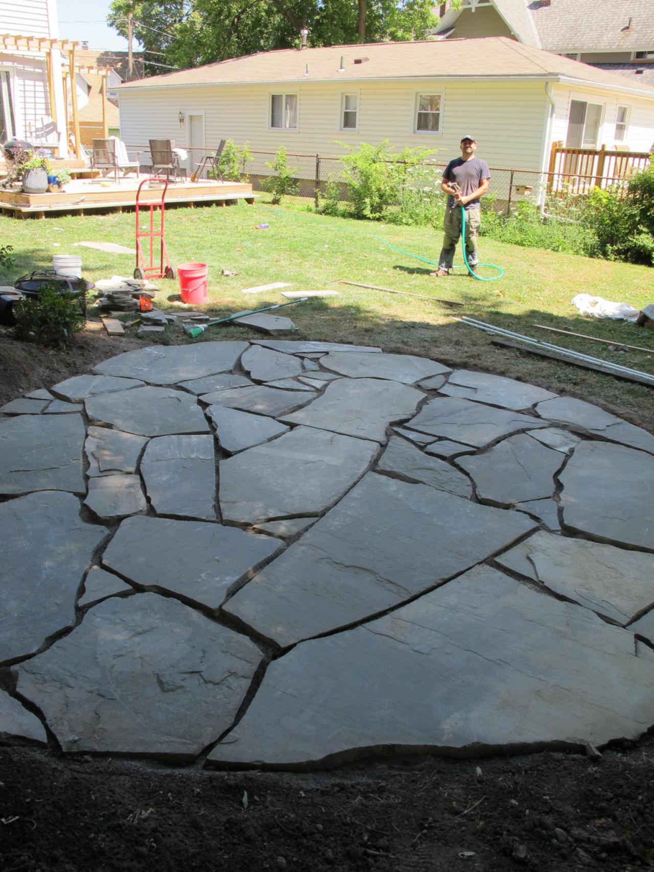 how to install a flagstone patio with irregular stones | diy network blog:  made + remade ZRWOCRZ
