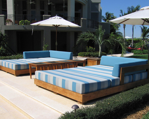 outdoor daybed example of an island style patio design in miami ASQDFKS