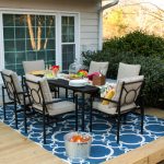 small patio decorating ideas: a beautiful back deck with a patio dining set  and a RZNDBKL