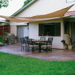 sun shade made in the shade, custom stamped concrete patio with shade sails to  provide protection from FIPWVQW