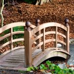 this is an example of a small garden bridge in wood. rather than bridging  the UEMFRSA