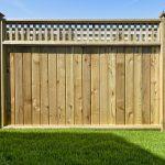 we love beautiful cedar fence designs. this one mixed with panels and  lattice work is FHJZIQQ