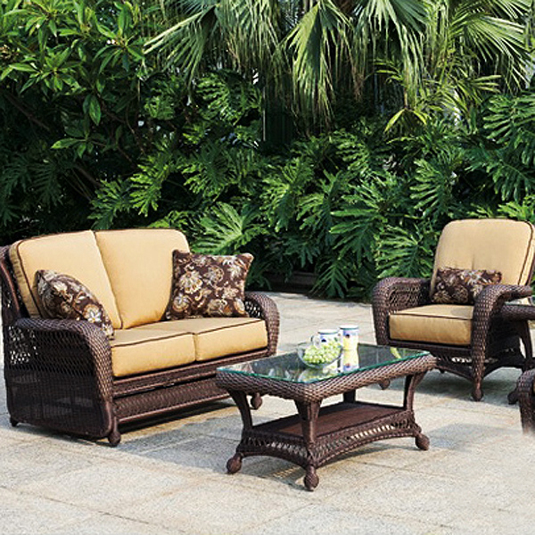 Use wicker outdoor furniture to brighten up your outdoor space