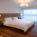 bedroom lights trendy bedroom photo in other with medium tone hardwood floors HPVGEEX