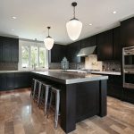 black kitchen cabinets with stainless steel accents QXVHLHI