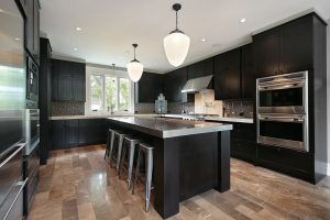 black kitchen cabinets with stainless steel accents QXVHLHI