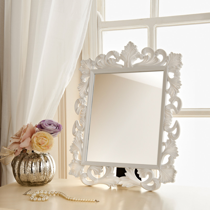 How can a dressing table mirror improve your room?