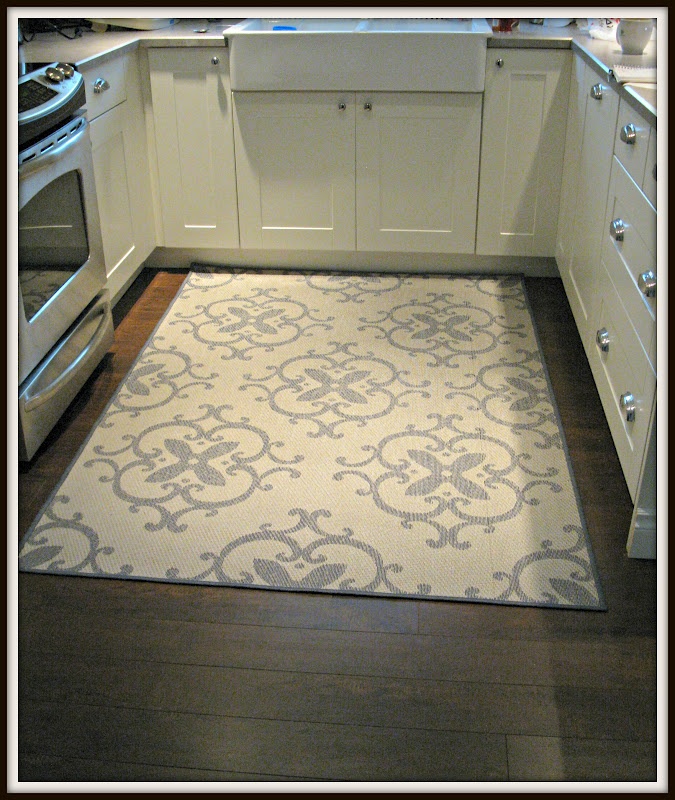kitchen rugs outdoor rug in kitchen (walmart)- great idea! warm under feet but washable DVSZPHV
