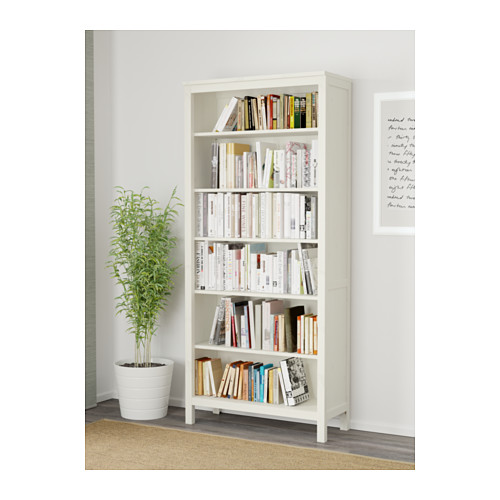 Fast access to books through white bookcase