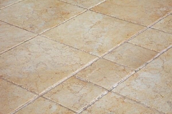 a tan colored ceramic tile floor. KDNTWXF