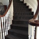 Carpet stairs project with carpet designed to look like a runner WZTNLFD