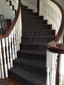 Carpet stairs project with carpet designed to look like a runner WZTNLFD