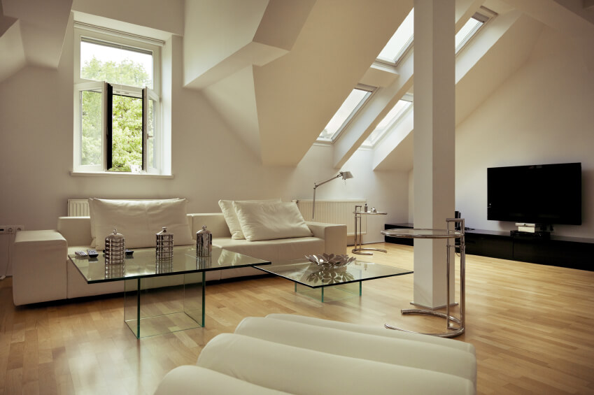 flooring materials for living room a mellow living room with light wood floors and ample sunlight. glass EMNVZLA