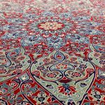 handmade carpets handmade carpet at the grand bazaar in istanbul, turkey | stock photo | VZHDEDG
