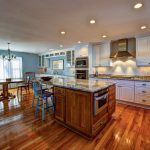 hardwood floors in kitchen large kitchen with island, kitchen table with wood flooring JBBBOUQ