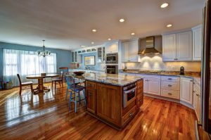 hardwood floors in kitchen large kitchen with island, kitchen table with wood flooring JBBBOUQ