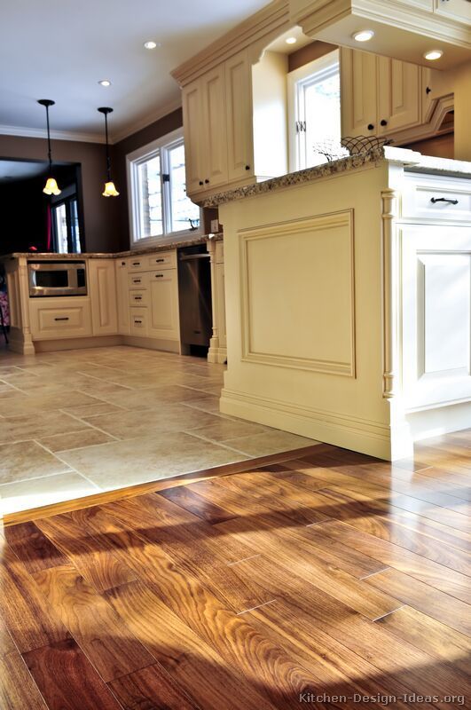 kitchen tile flooring #kitchen idea of the day: perfectly smooth transition from hardwood flooring  to SDQANOX