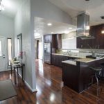 laminate flooring kitchen cabinets the pros and cons of laminate flooring AWAAHFV