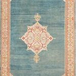 oushak rugs strongly outlined palmettes and delicate botanical decorations adorn the  central medallion of IXQCNHI