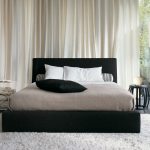white area rug bedroom elegant bedroom with black cushioned bed on white shag area rug also corner IOJBEGZ