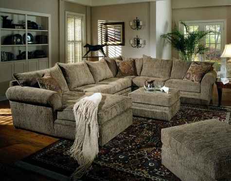 big super comfy sectional couch where both ottomans would fit in the