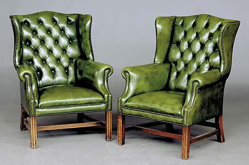 193: Pair Georgian style green leather wingback chairs : Lot 193