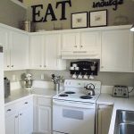 black accents, white cabinets! Really liking these small kitchens