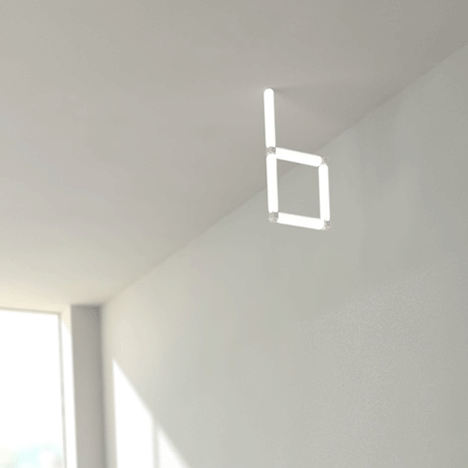 Modular lighting system sticks together with magnets