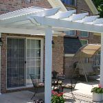 Patio Transformed with Attached Low Maintenance Vinyl Pergola Kit & Fan