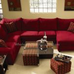 Diggin' the red sectional and the coffee table with the pull-out