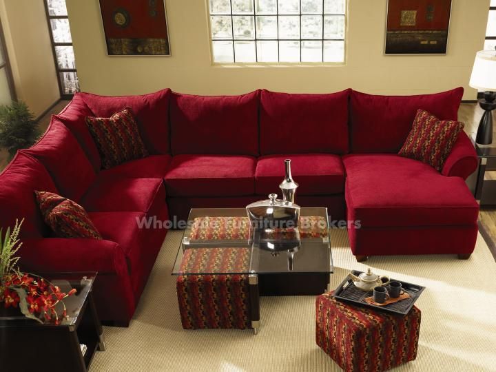 Diggin' the red sectional and the coffee table with the pull-out