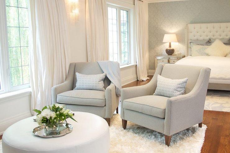 Bedroom Sitting Area with Gray Chairs and White Ottoman